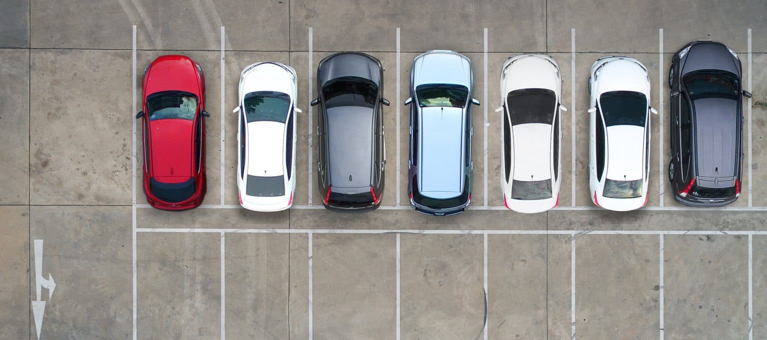 Cars parked in marked parking bays
